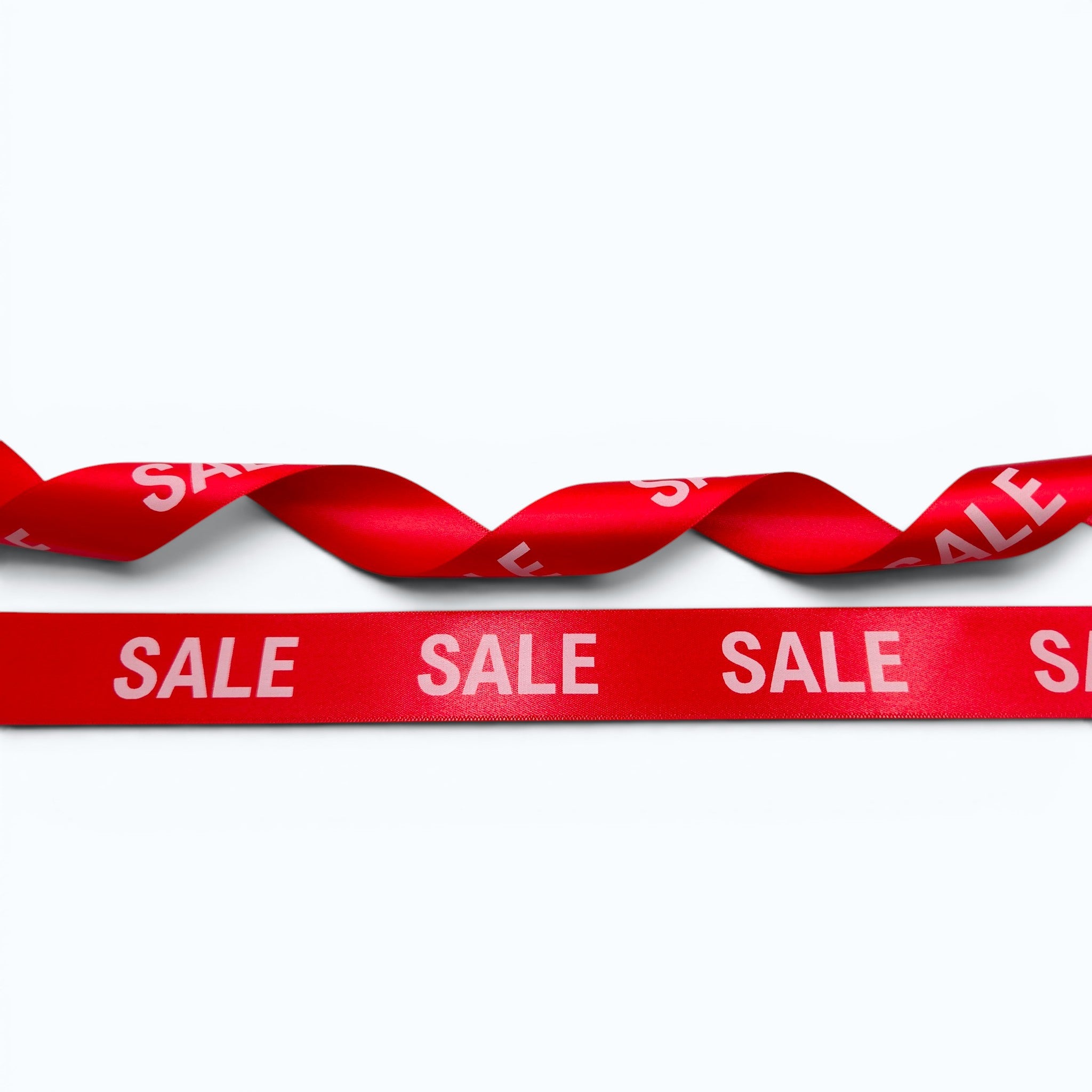 20mm Luxury satin ribbon printed with footballs per 25 meter roll.