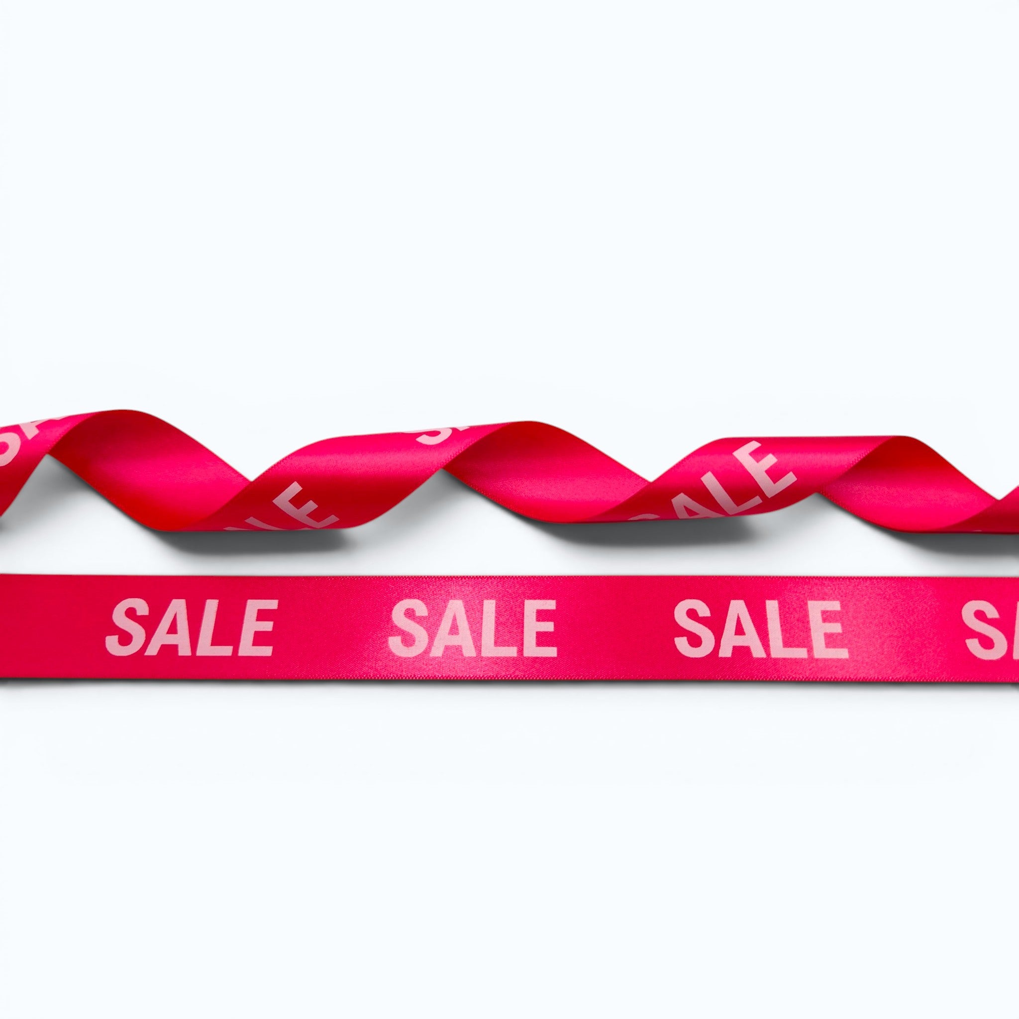 20mm Luxury satin ribbon printed with footballs per 25 meter roll.