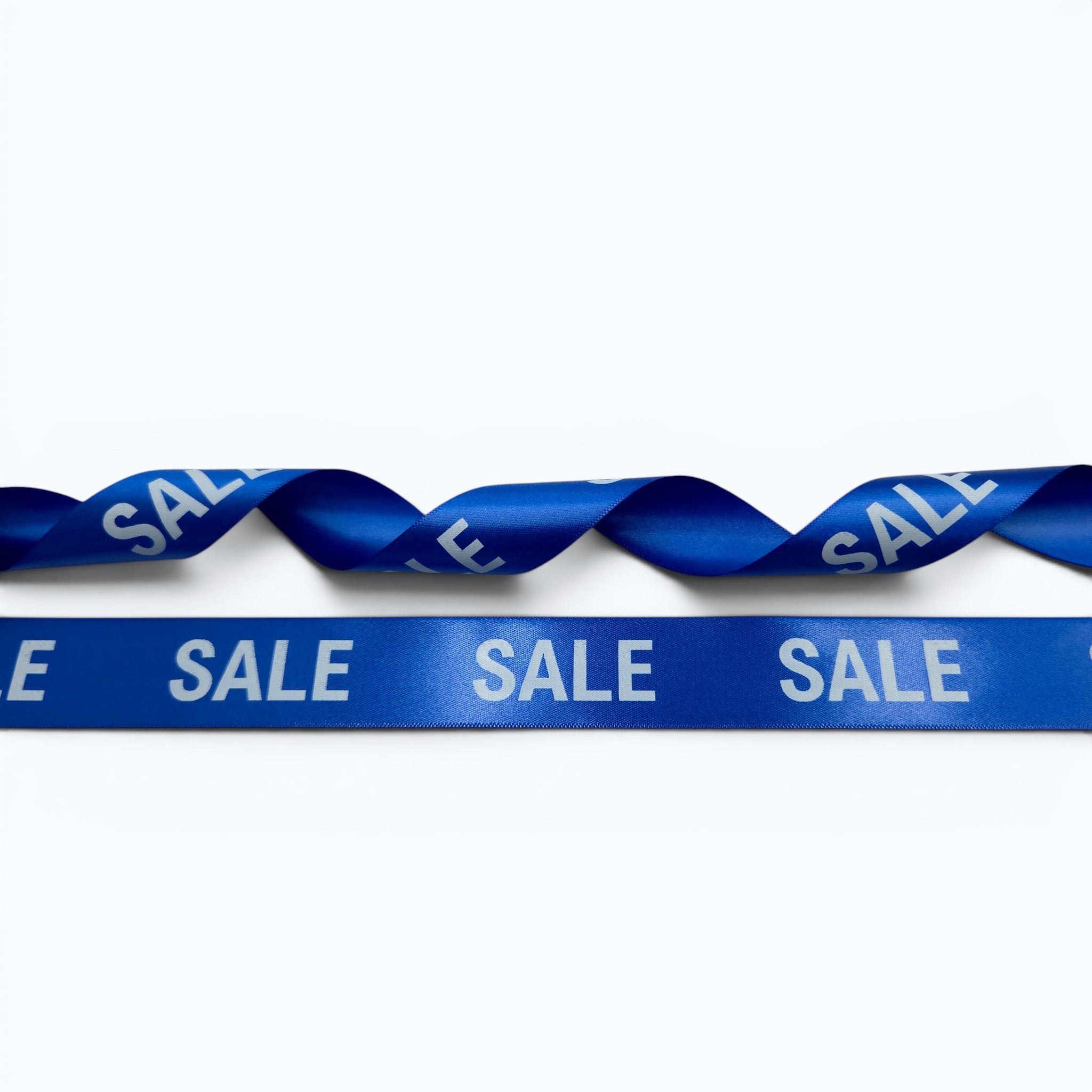 20mm Luxury satin ribbon printed with footballs per 25 meter roll.