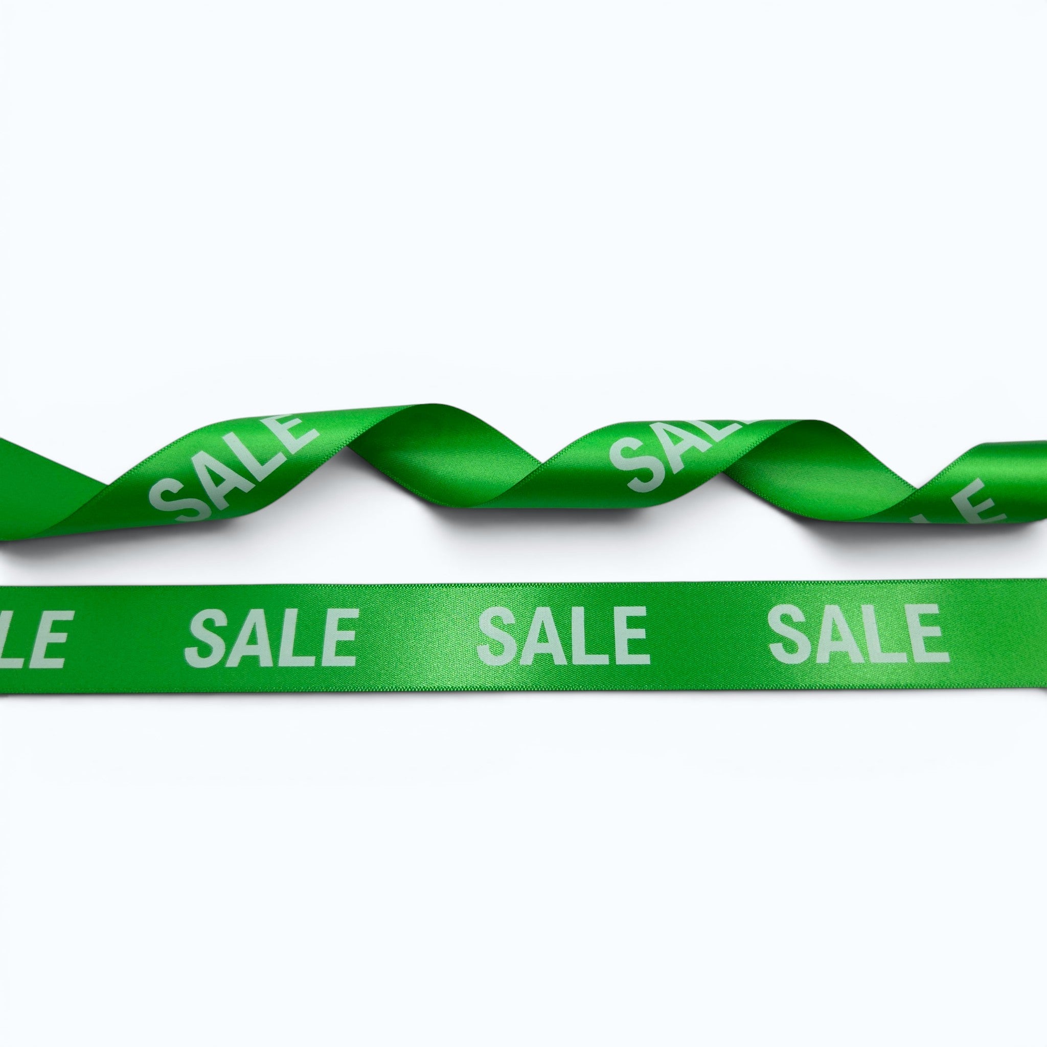 20mm Luxury satin ribbon printed with footballs per 25 meter roll.