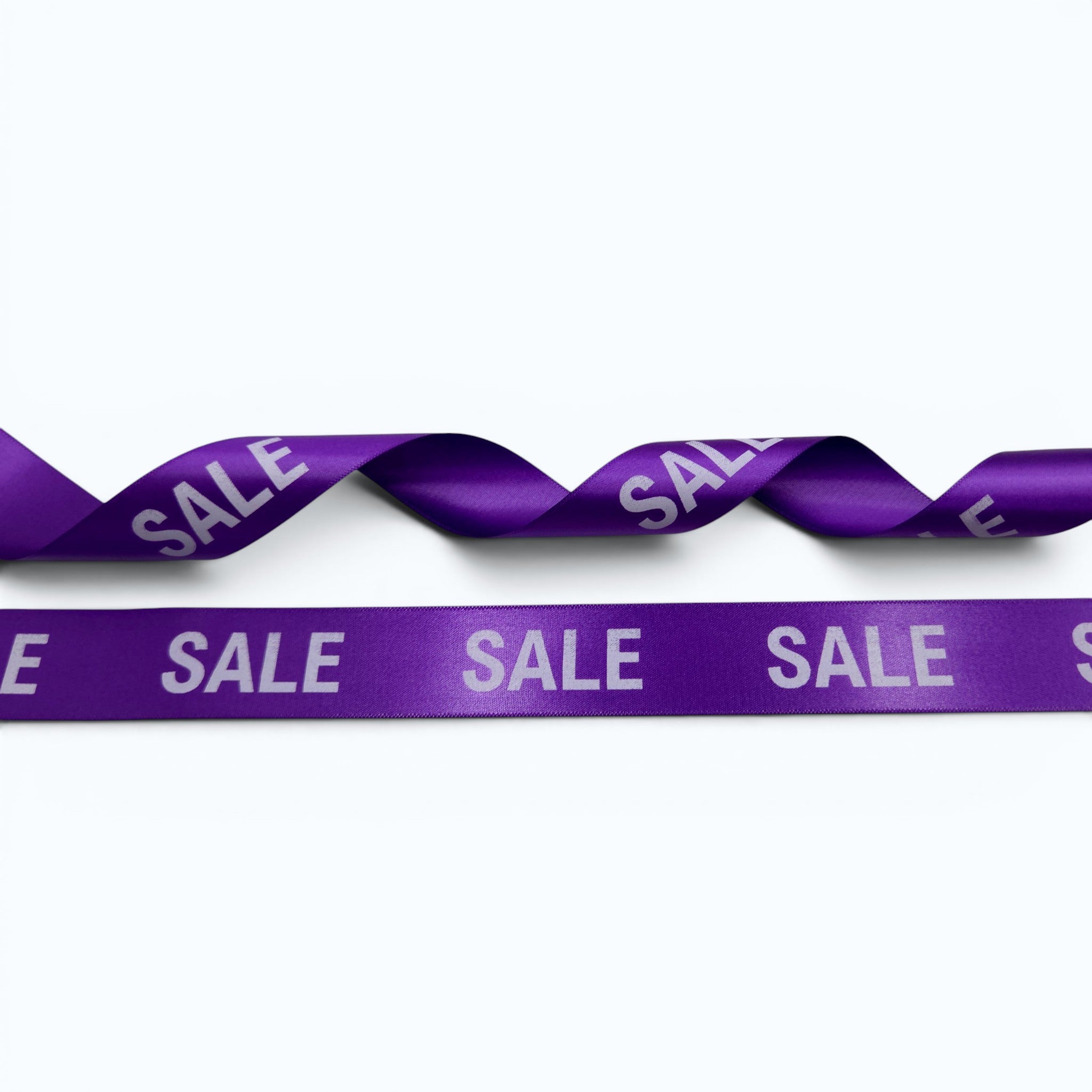 20mm Luxury satin ribbon printed with footballs per 25 meter roll.