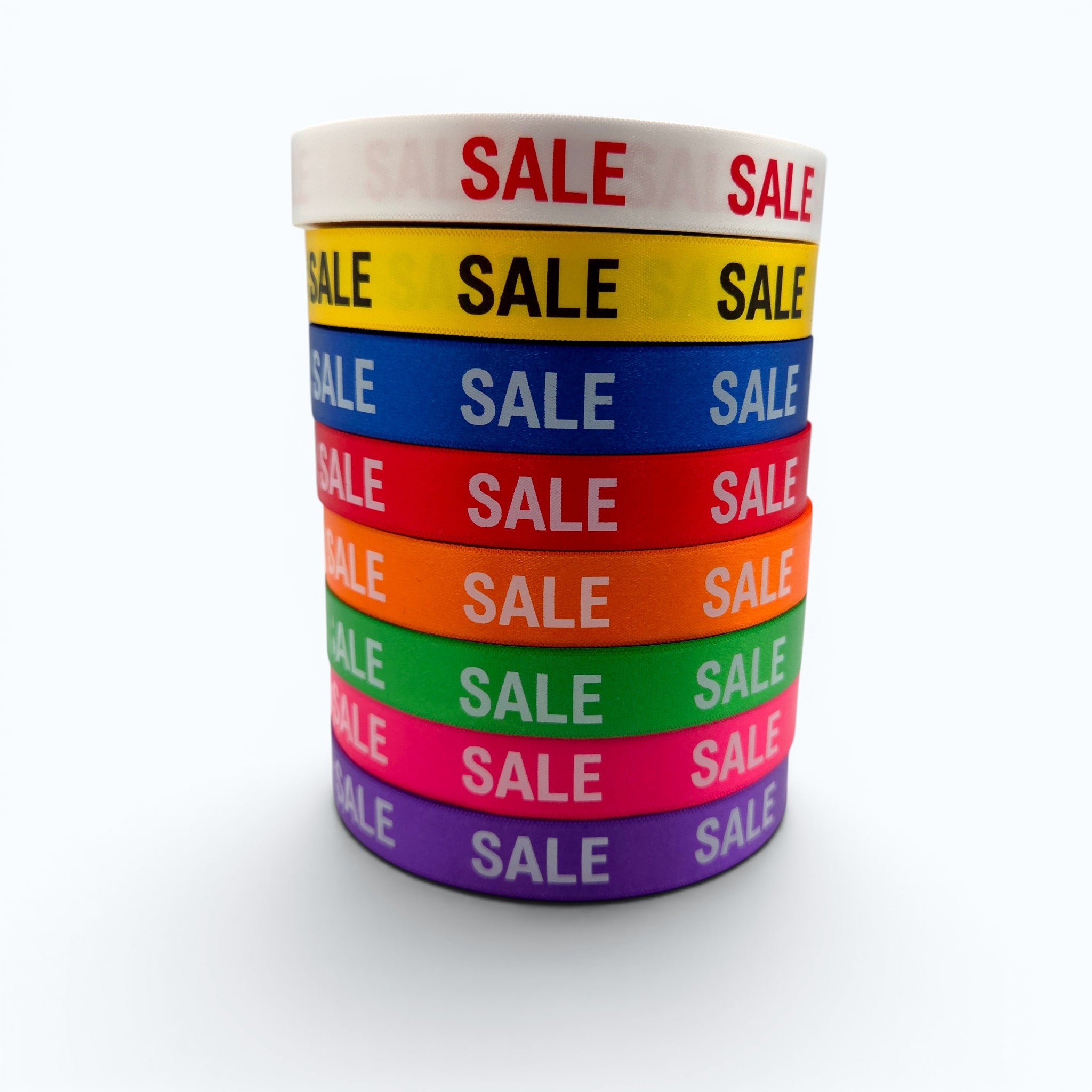 20mm Luxury satin ribbon printed with footballs per 25 meter roll.