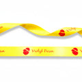 20mm Luxury satin ribbon printed with footballs per 25 meter roll.