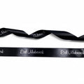 20mm Luxury satin ribbon printed with footballs per 25 meter roll.