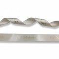 20mm Luxury satin ribbon printed with footballs per 25 meter roll.