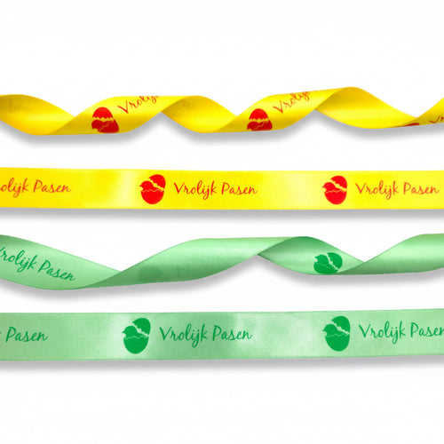 20mm Luxury satin ribbon printed with footballs per 25 meter roll.