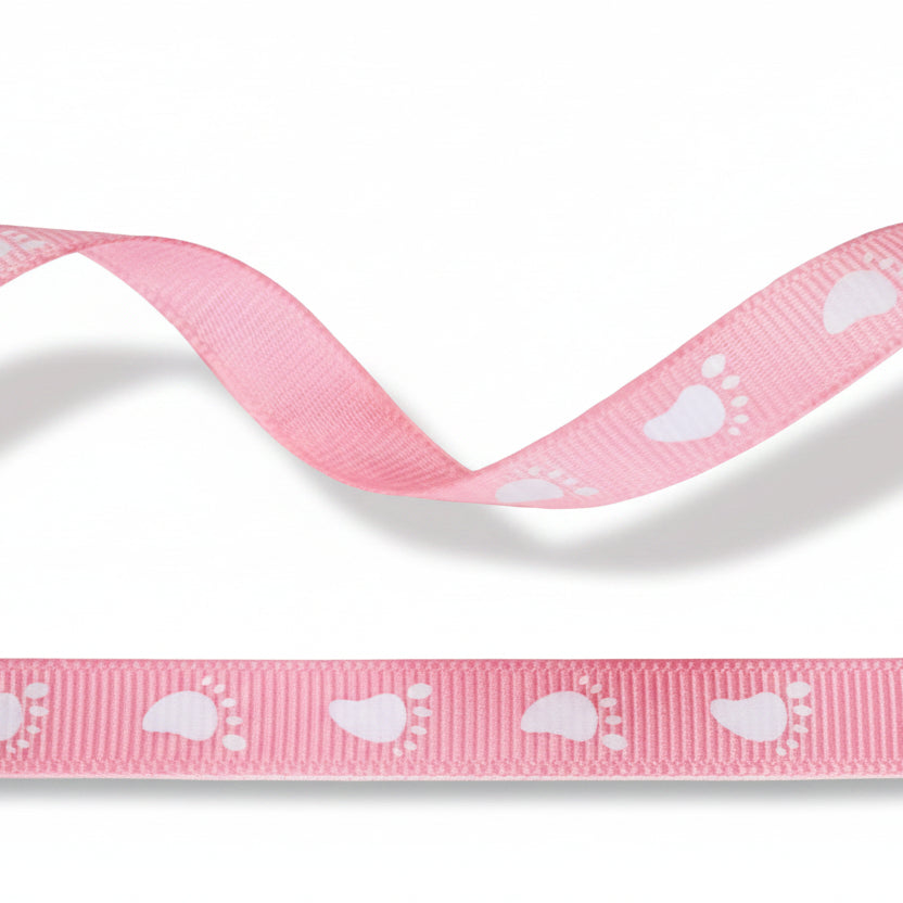 Pink grosgrain ribbon with white baby footprints
