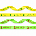 20mm Luxury satin ribbon printed with footballs per 25 meter roll.